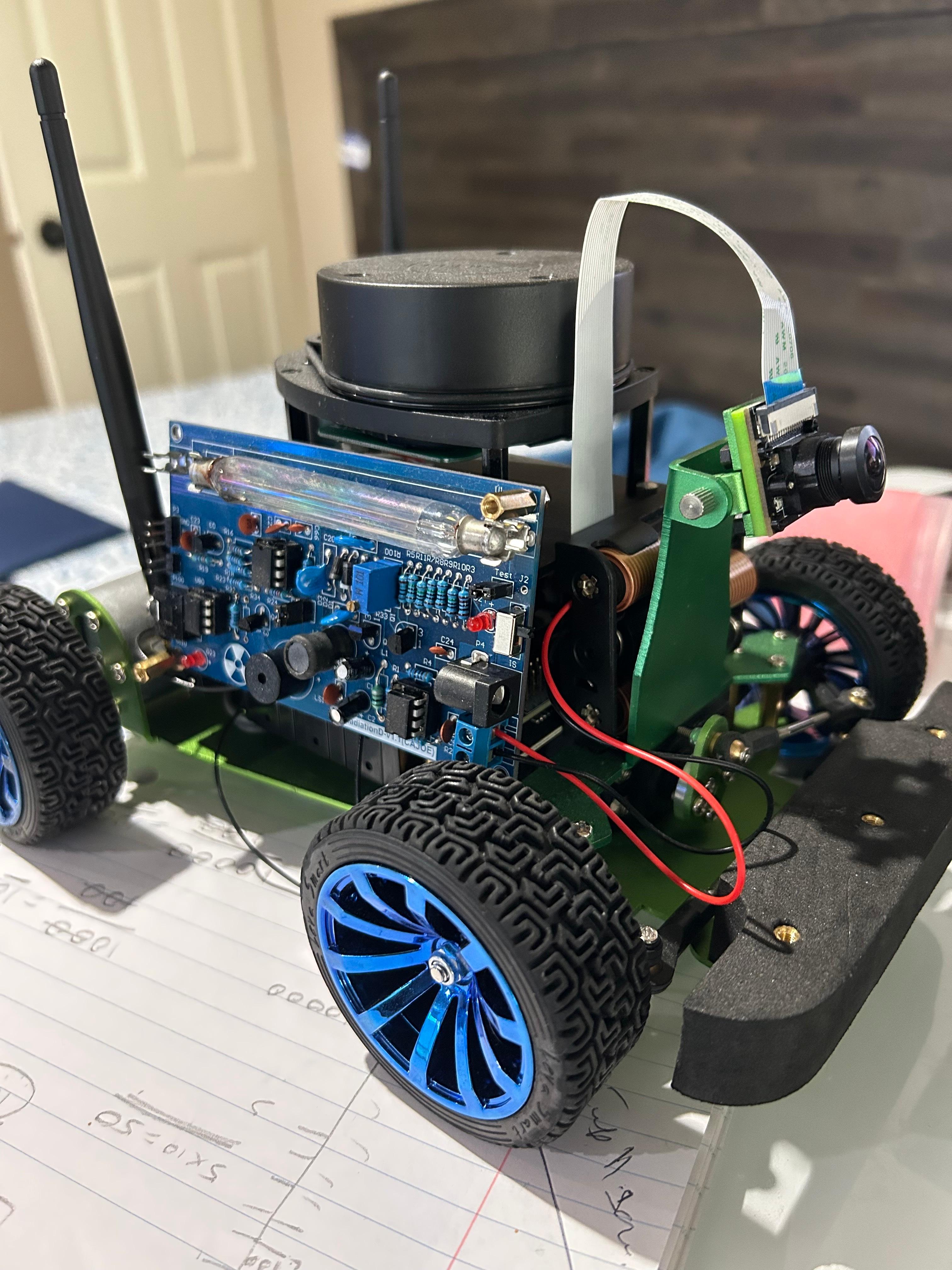 Developing and Simulating a Novel Radon Gas Leak Pinpointing Ackermann Drive Robot Using OpenMC, Geiger Counters, and ROS