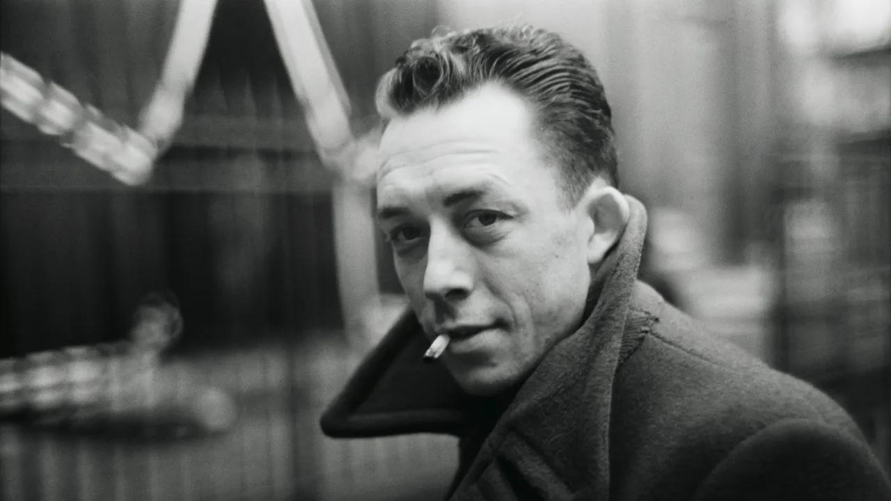 How did Albert Camus respond to the German occupation of France and French colonialism in his novel The Plague?