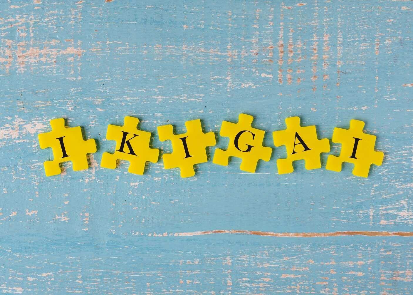Yellow puzzle pieces with black letters against blue backdrop