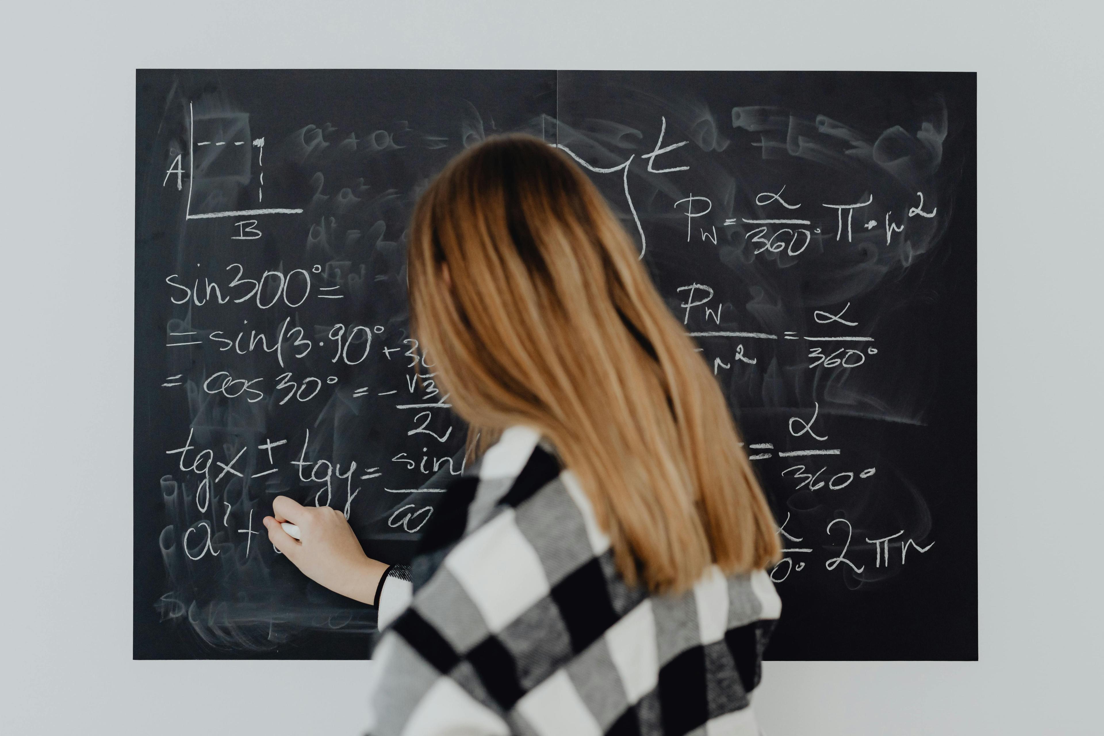a girl solving a math problem