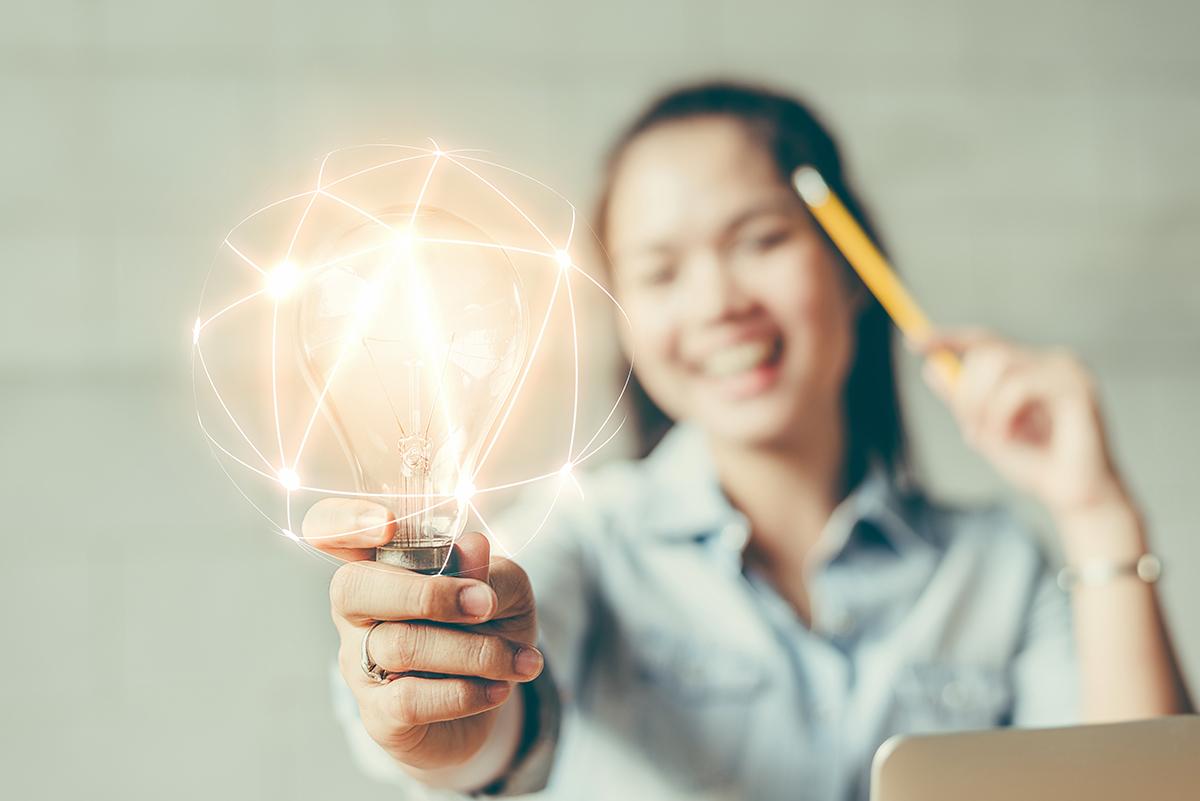 Inspired female student smiling