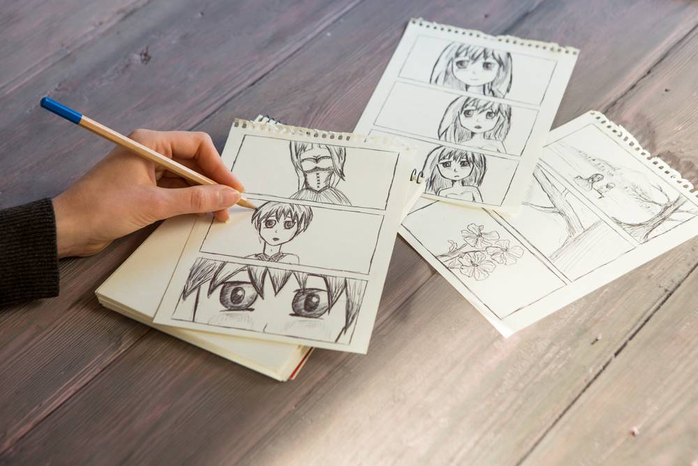 Artist drawing an anime comic book