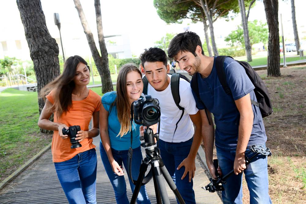 group of young people during outdoor photo course 